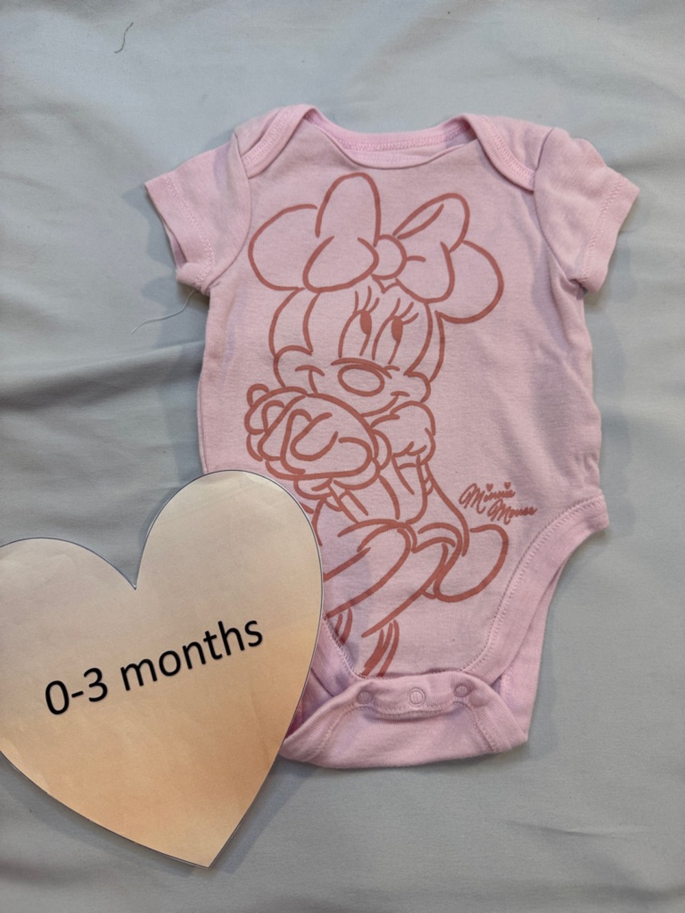 Disney Light Pink Minnie Mouse Outline Bodysuit
